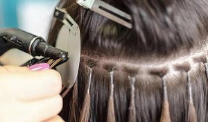 how to remove glue in hair extensions